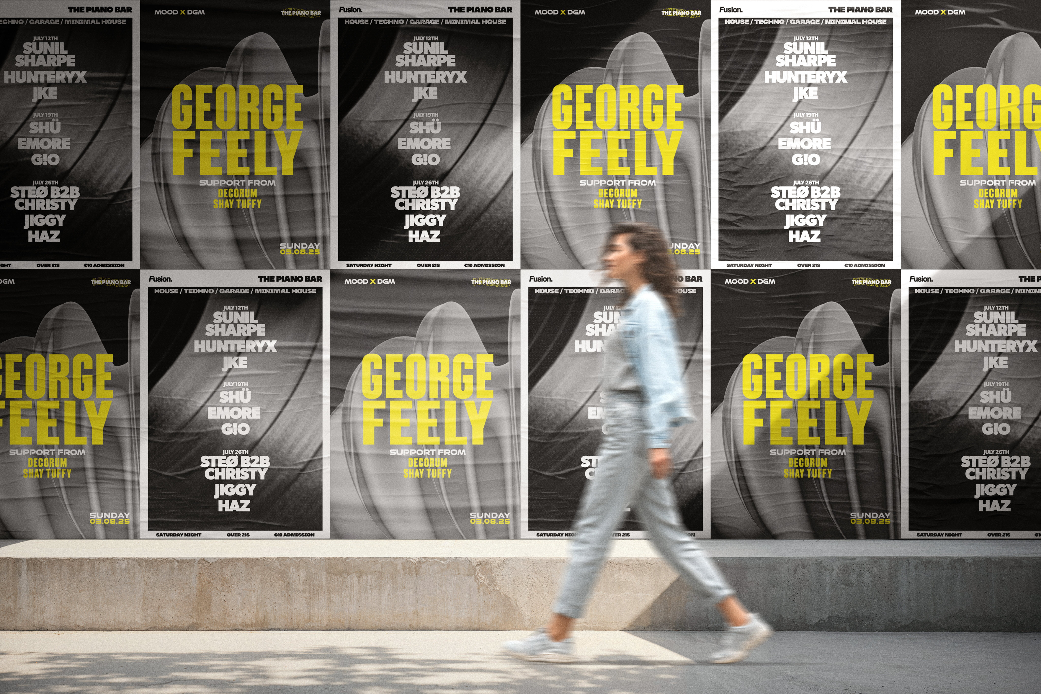 man walking in front of textured wall